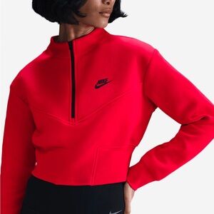 Brand New Women’s Nike Tech half zip top. Size M